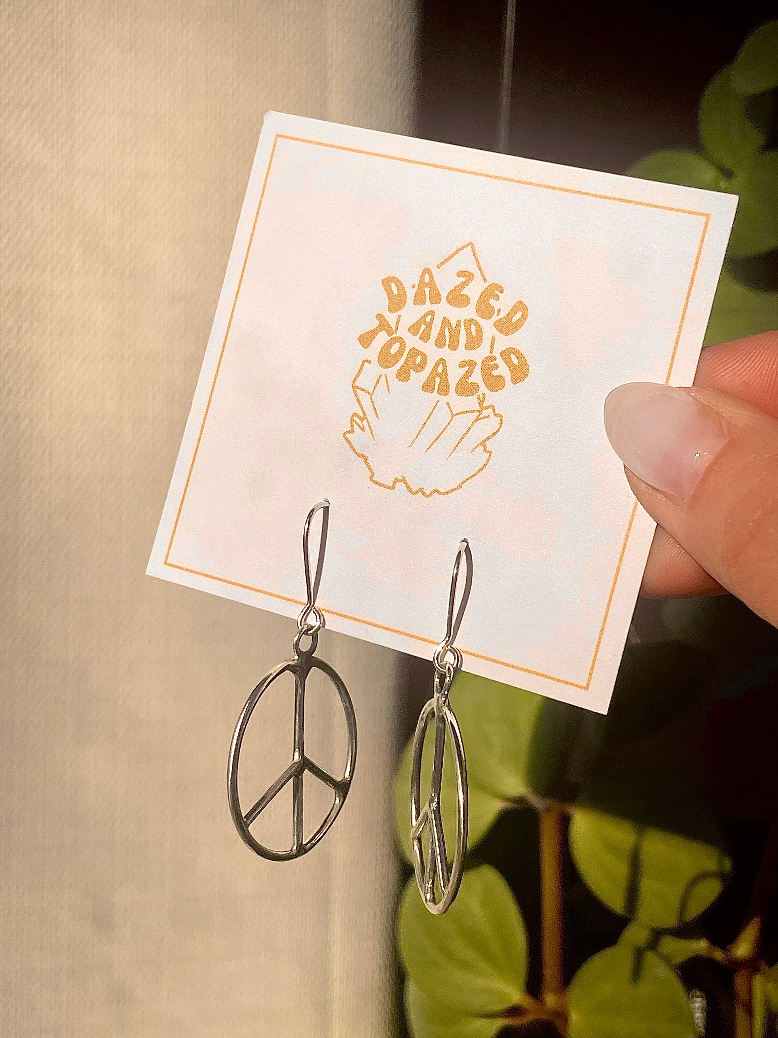 January Earring of the Month Peace Sign Earrings Dazed and Topazed