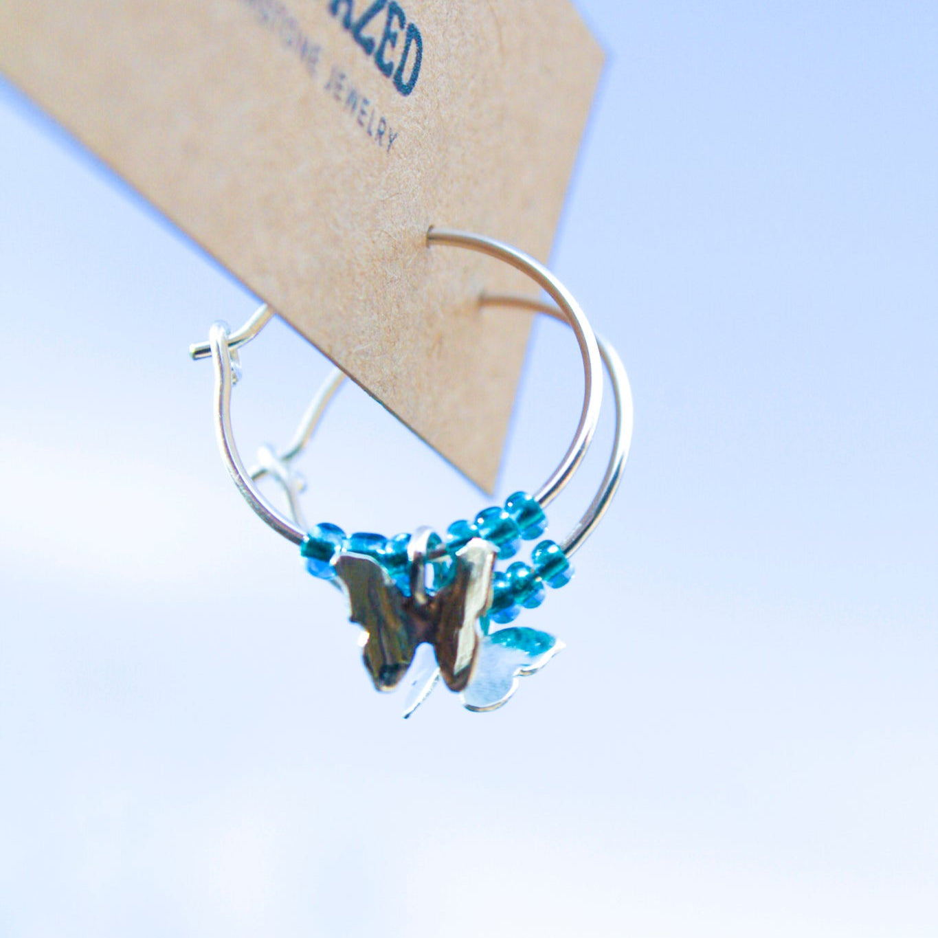 January Earring of the Month: Sterling Silver Butterfly Hoop Earrings