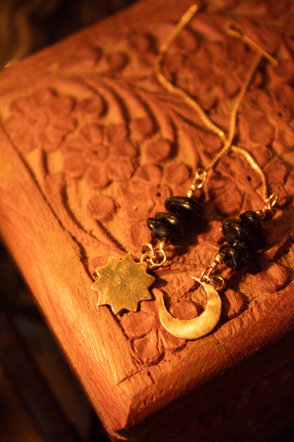 October Earring of the Month: Obsidian Sun + Moon Threaders